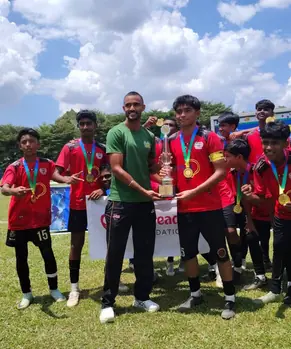 Football team with trophy and medals